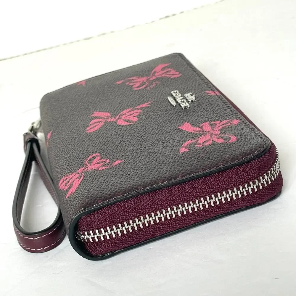 Coach CZ327 Pink Bow Long Zip Wallet Merlot Canvas Phone Wristlet